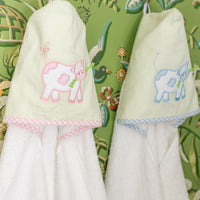 Handing hooded towels for children featuring blue and pink cow applique, 3 Marthas