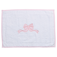 White terry bath mat with a pink gingham bow applique