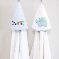 3 Marthas white terrycloth hooded towel with blue and green applique dino and blue check trim for boys. White terrycloth hooded towel with blue seersucker stripes for boys.