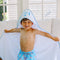 Photo of boy wearing airplane hooded towel