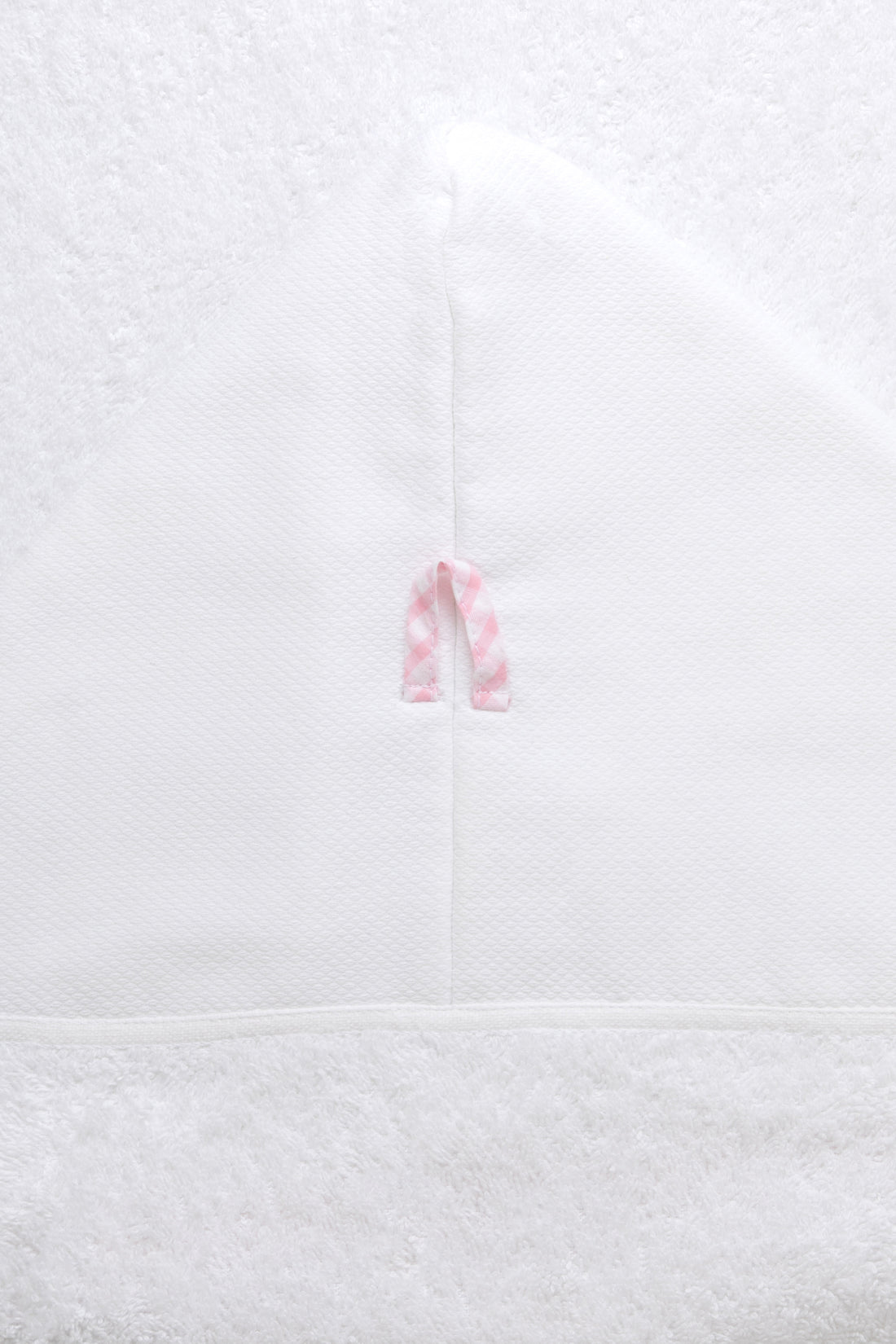 Back of hooded towel, featuring loop for hanging to dry, 3 Marthas