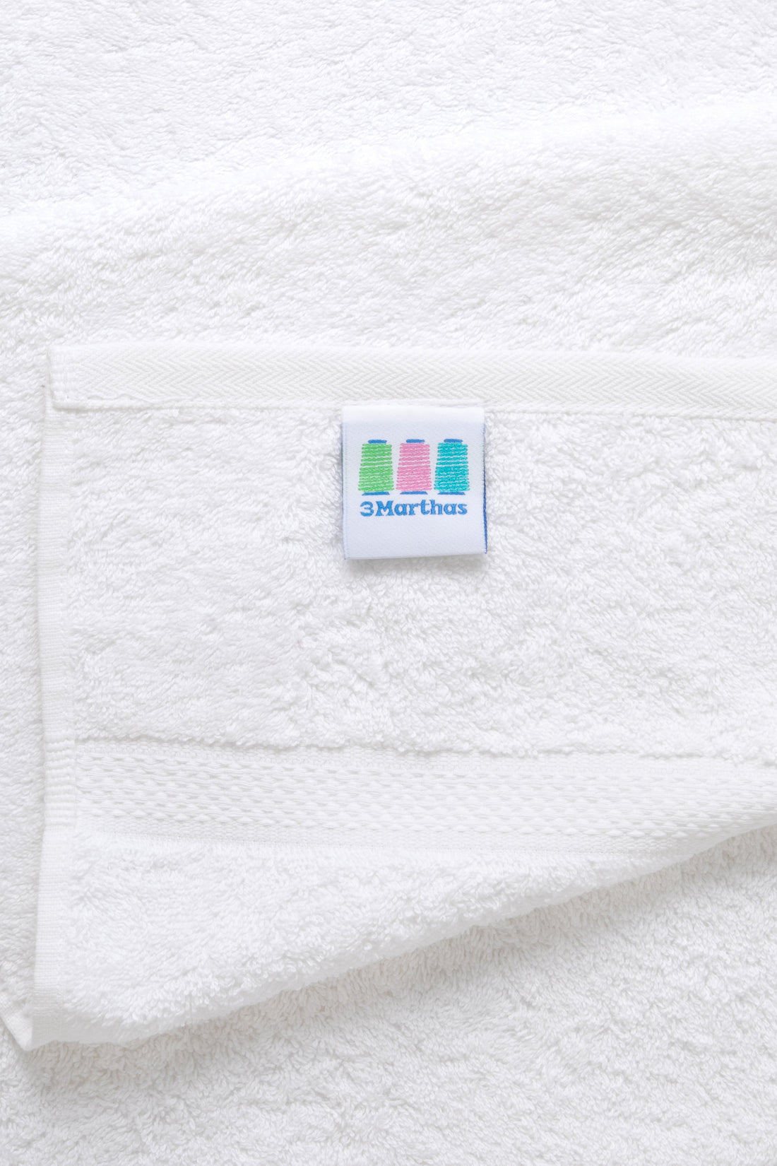 Terry cloth close up with 3 Marthas tag