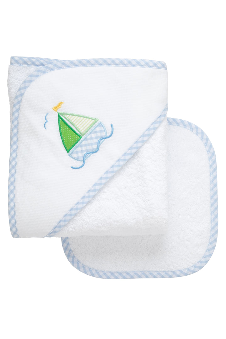 Cotton terry hooded towel and washcloth for baby to toddlers with a blue and green sailboat applique on the hood, 3 Marthas