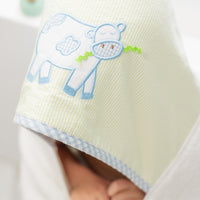 Hooded towel for children featuring a blue cow applique, 3 Marthas