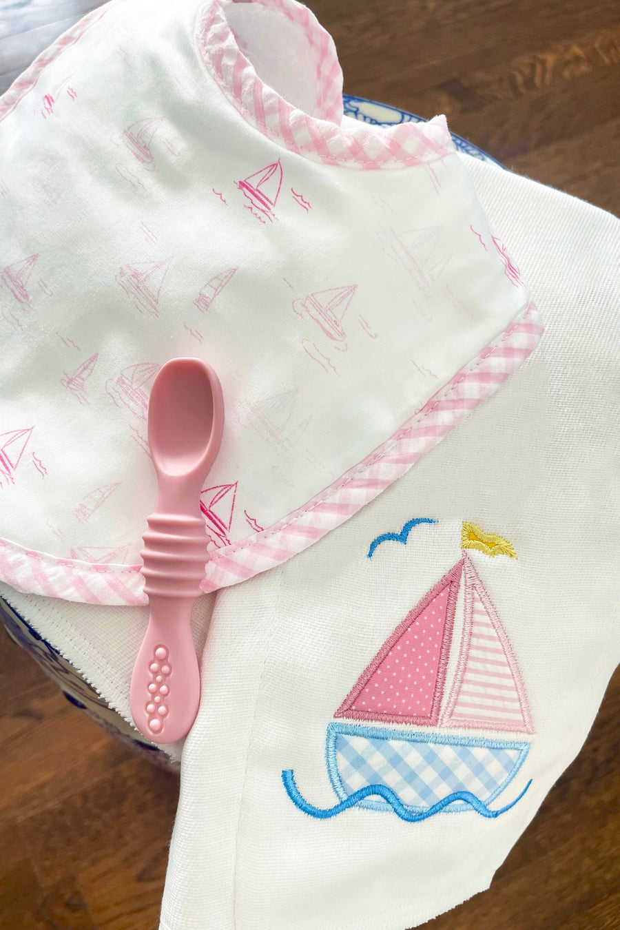 Cotton bib for baby girl with pink sailboat print fabric and pink gingham check trim and burp cloth with pink sailboat applique, 3 Marthas