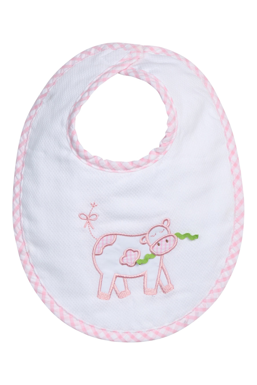 Baby bib with cow design and pink trim on a white background