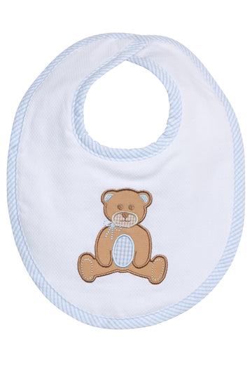 Baby bib with teddy bear design on a white background