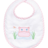 White bib with pink hippo design on a white background, 3 Marthas