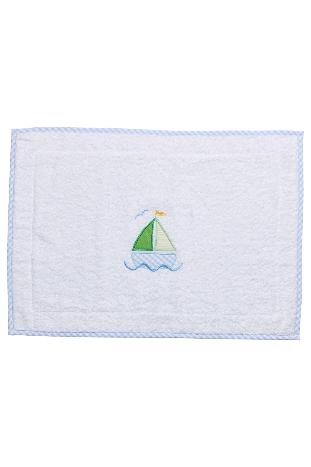 White terry bath mat with a blue sailboat applique