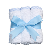 Three washcloths, trimmed in blue gingham check, rolled and tied with blue ribbon