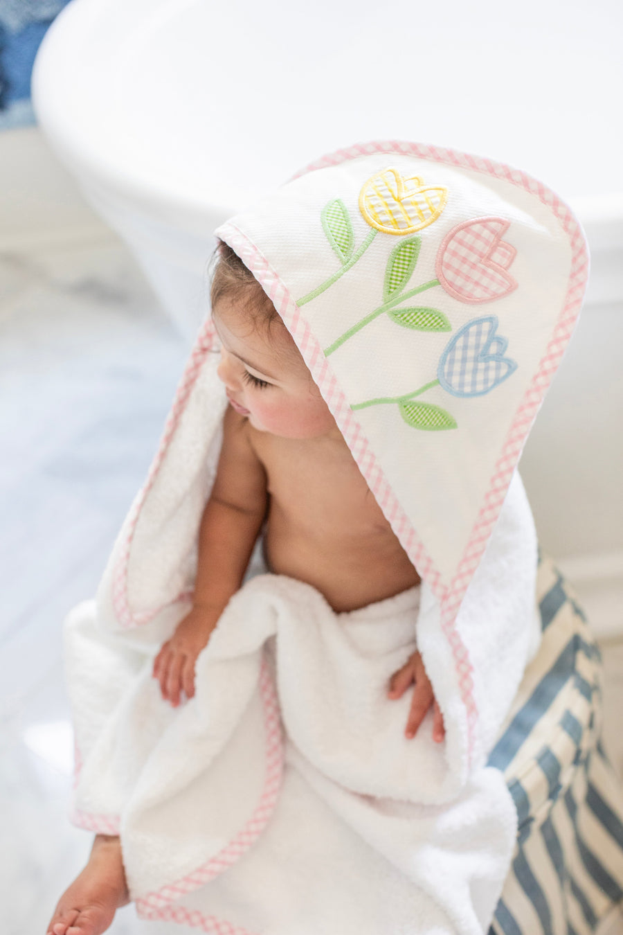 3 Marthas white terrycloth hooded towel with multicolor tulip applique and pink check trim for little girls. 