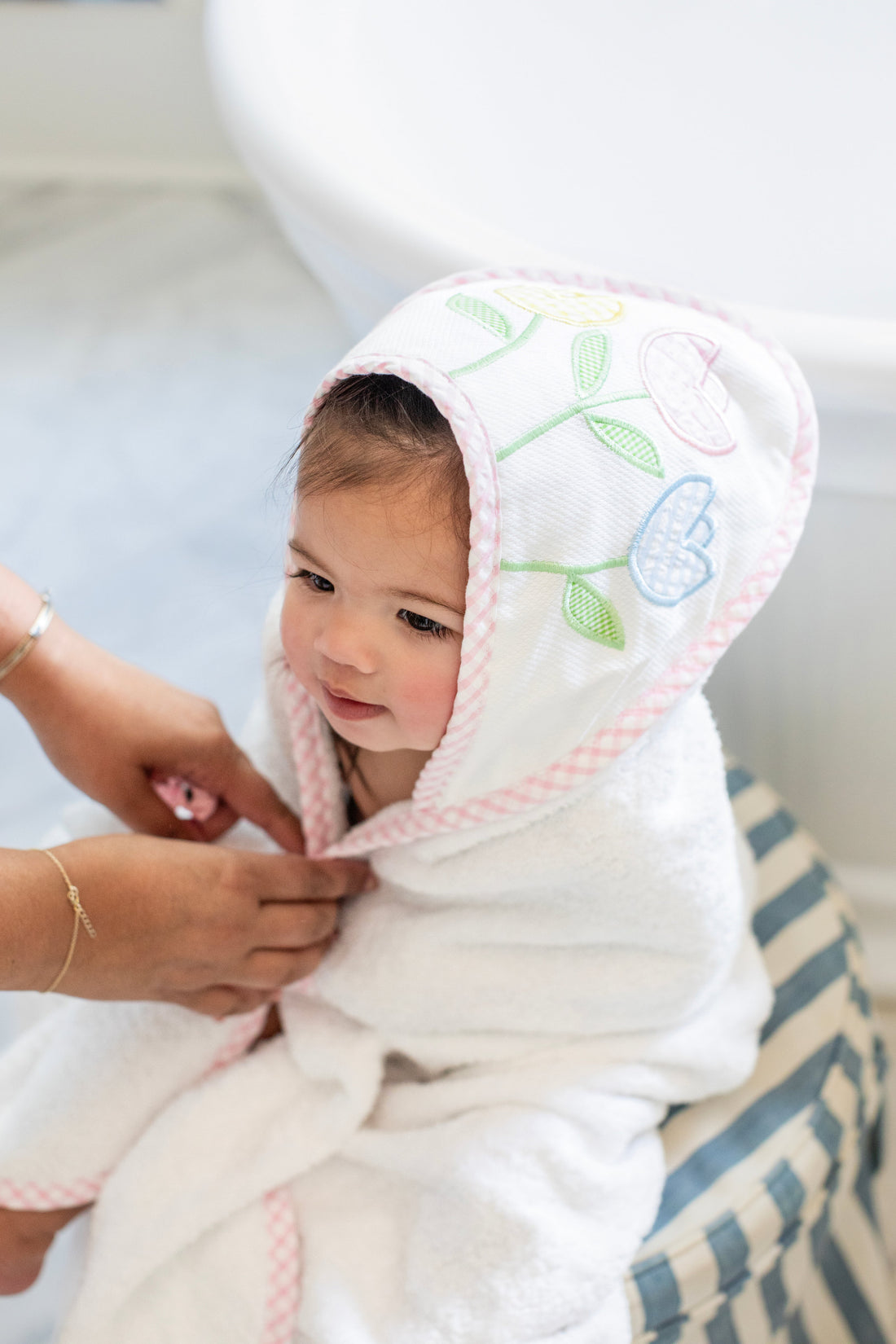 3 Marthas white terrycloth hooded towel with multicolor tulip applique and pink check trim for little girls. 